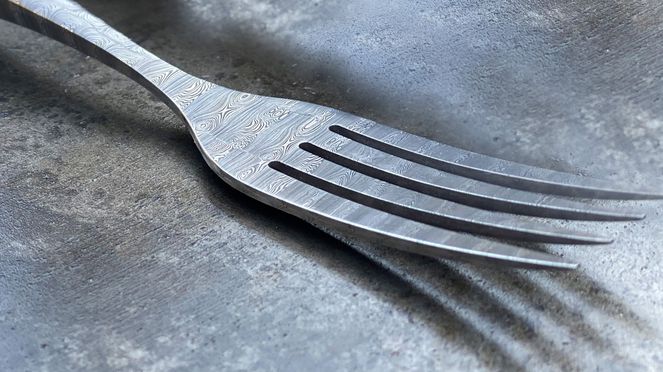 
                    swiss damask fork, a crafts masterpiece