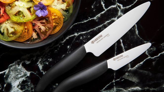 
                    Kyocera Keramik Schälmesser der schwarz-weissen FK Serie