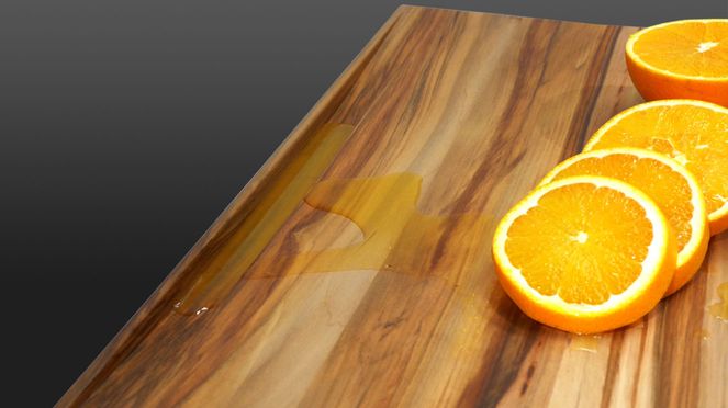 
                    Planche à découper L avec des oranges