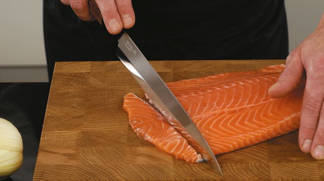 
                    The Red Wood Yanagiba is ideal for cutting salmon