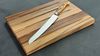 
                    The bread/cheese board and the Wok bread knife are a perfect duo
