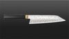 
                    Goldfarbenes Bolster des Ensei Kiritsuke: inspiriert vom „Habaki“, dem Metallkragen am Übergang von Griff zu Klinge beim Samurai-Schwert