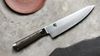 
                    Delicate pattern of dual-core damask steel winding its way along the cutting edge of the Shun Kagerou chef’s knife